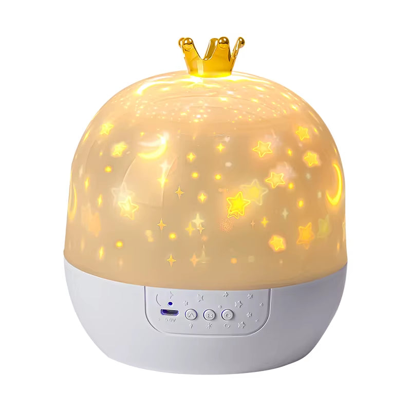 The Tren-Dora StarGlow™ Rotating Galaxy Projector Lamp features a white base with controls, a gold crown, and a translucent dome that projects adjustable glowing yellow stars, moons, and dots in your room.